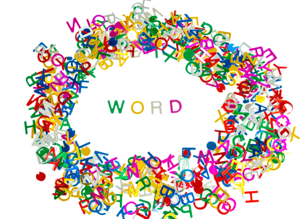 "Word" is spelled in the middle of a colorful pile  of letters.